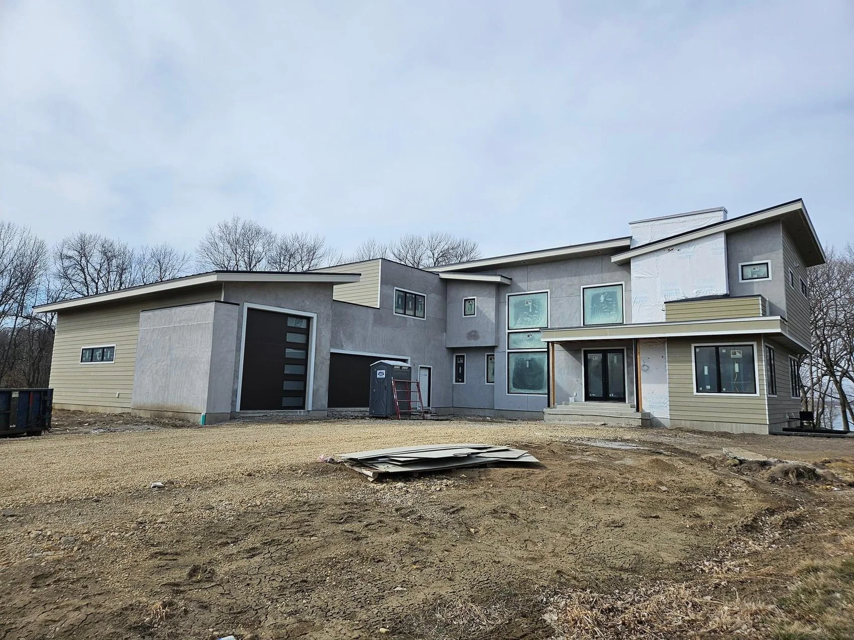 Field Modern Custom Home Exterior Progress