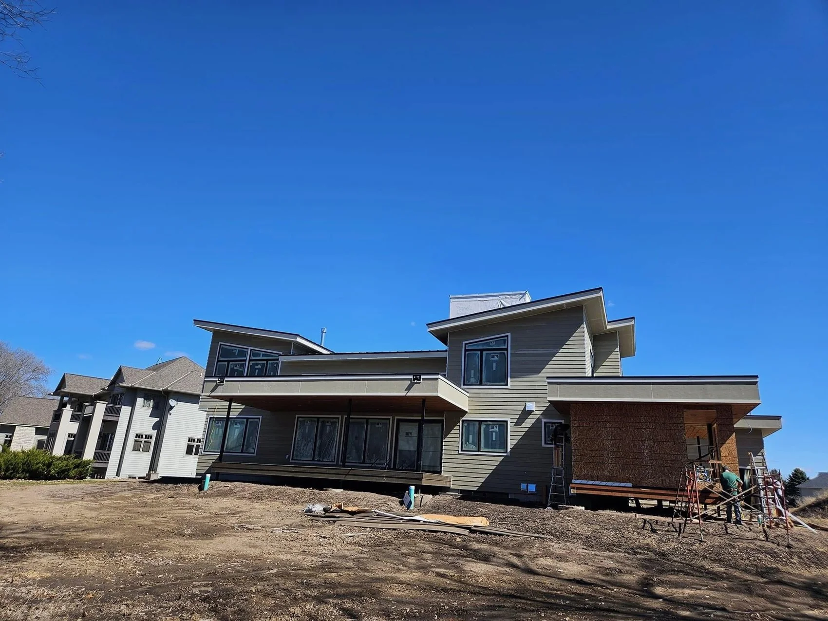 Field Modern Custom Home Rear Exterior Progress