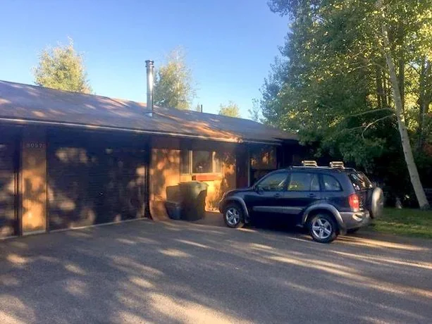 Remodel Exterior Before Dark Cabin