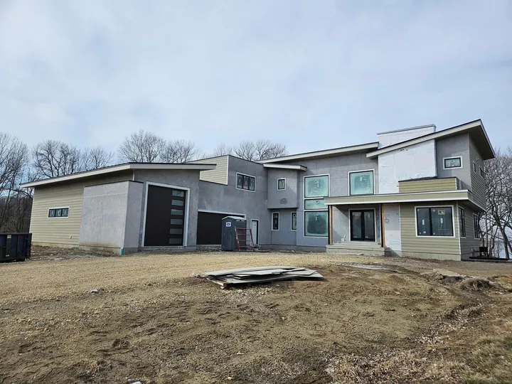 Modern custom home exterior in progress