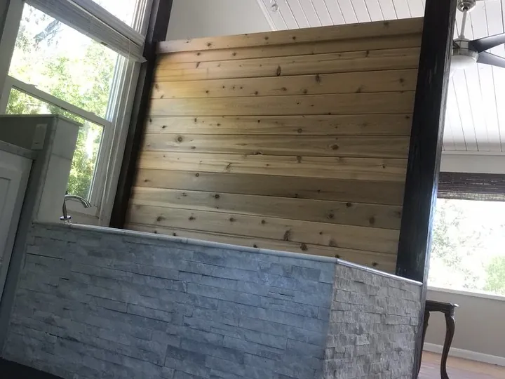 Wood and stone bathroom remodel